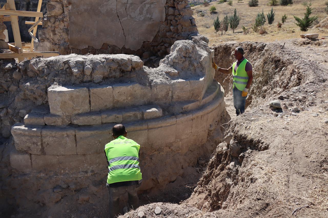 Restoration workers excavate around the historic Sultan Melik Tomb in Kemah, Erzincan, Türkiye, Sept. 15, 2026. (AA Photo)