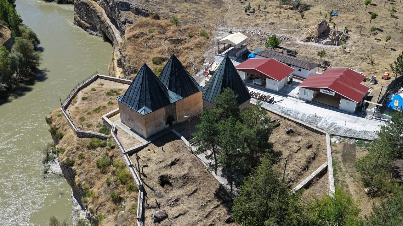 An aerial view shows the Sultan Melik Tomb complex and restoration works beside the Karasu River in Kemah, Erzincan, Türkiye, Sept. 15, 2026. (AA Photo)