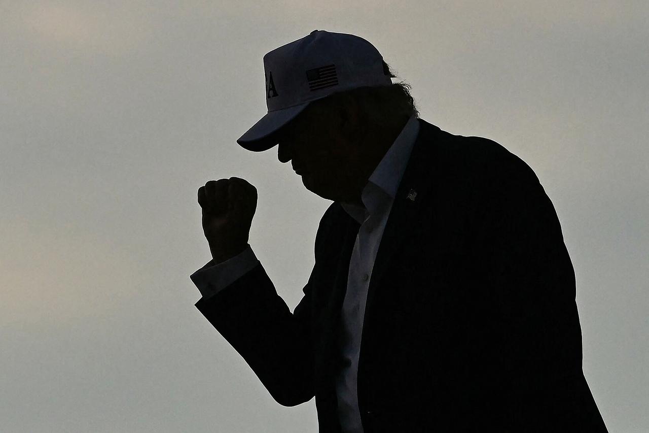US President Donald Trump gestures before boarding Air Force One as he departs from Shannon Airport, western Ireland, on September 13, 2026. (AFP Photo)