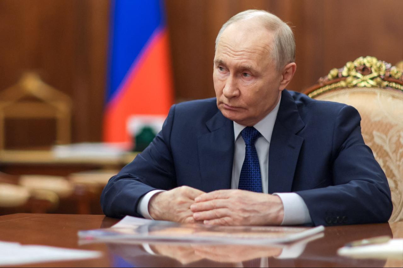 In this pool photograph distributed by the Russian state agency Sputnik, Russia's President Vladimir Putin attends a meeting with the governor of Pskov region in Moscow on September 10, 2026. (Photo by Sputnik / AFP)