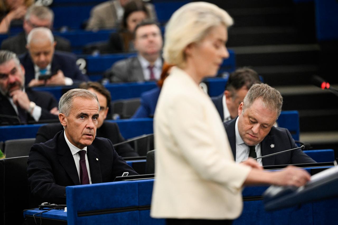 Canada's Prime Minister Mark Carney listens to European Commission President Ursula von der Leyen delivering a speech during her annual State of the Union address at a plenary session of the European Parliament in Strasbourg, eastern France on September 16, 2026. (AFP Photo)