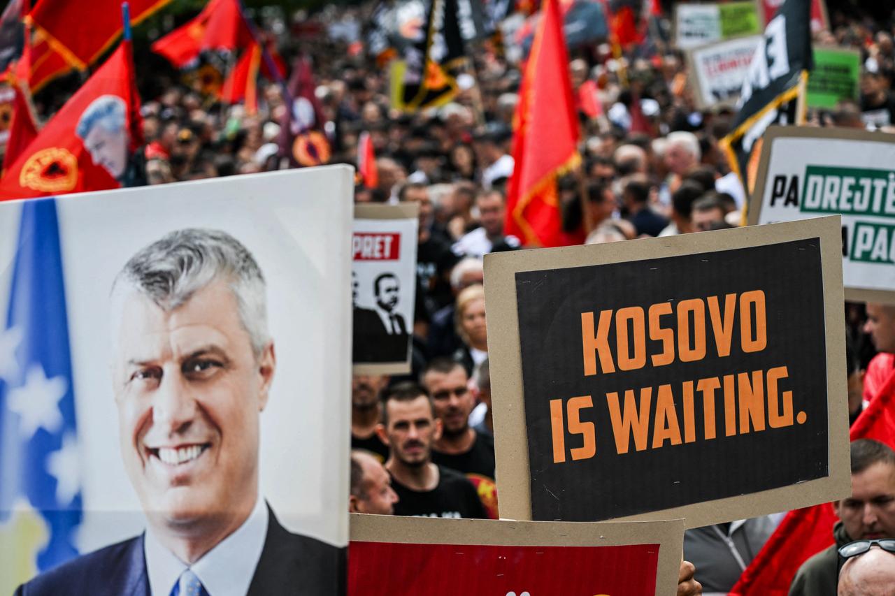 Kosovo Albanians holding a placard reading "Kosivo is waiting" and an image of former President Hashim Thaci take part in the the “March for Freedom” in Pristina on September 12, 2026. (AFP Photo)