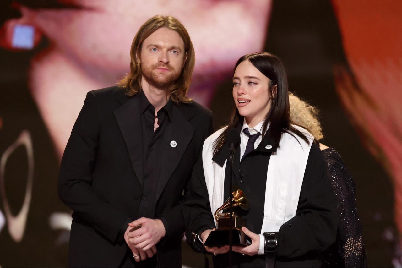 Finneas O’Connell and Billie Eilish receive the Song of the Year award for “Wildflower” on stage at the 68th Grammy Awards at the Crypto.com Arena in Los Angeles, California, February 1, 2026. (AFP Photo)