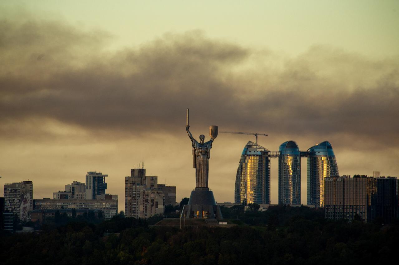 This photograph shows Mother Ukraine statue as fire and smoke rising following Russian missiles strike in Kyiv, Ukraine, early on September 8, 2026. (AFP Photo)