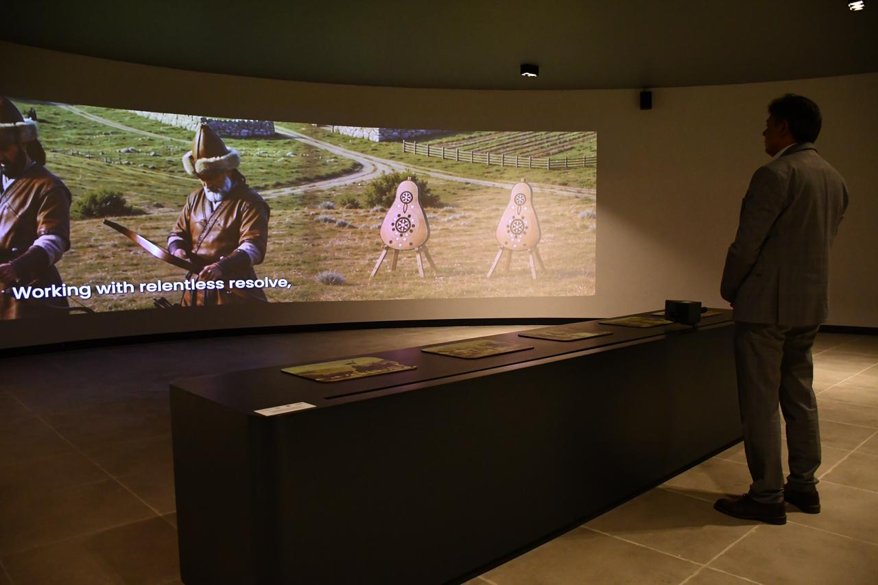 Sogut Mayor Ferhat Durgut watches an audiovisual presentation on Turkish history at the From Principality to Empire Digital History Museum in Sogut, Bilecik, Türkiye. (AA Photo)