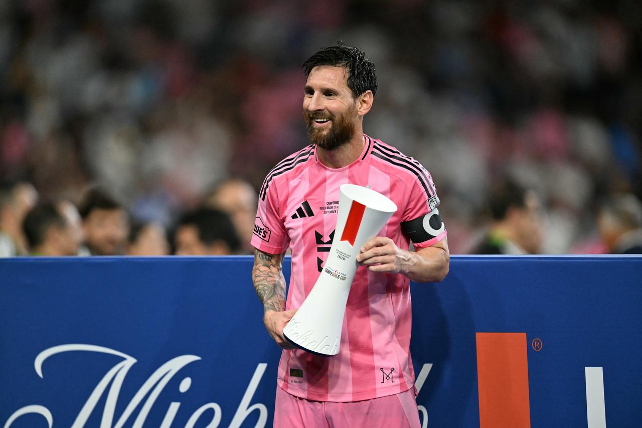 Inter Miami's Argentine forward #10 Lionel Messi holds the Superior Player of the Match trophy after his team defeated Mexico's Cruz Azul in the Campeones Cup final at Nu Stadium in Miami, Florida, on September 16, 2026. (AFP Photo)