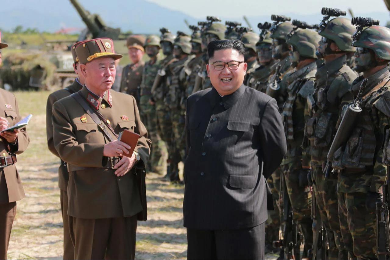 North Korean leader Kim Jong-Un (C) presiding over a target strike exercise conducted by the special operation forces of the Korean Peoples Army (KPA) at an undisclosed location, August 26, 2017. (Photo via KCNA/AFP)