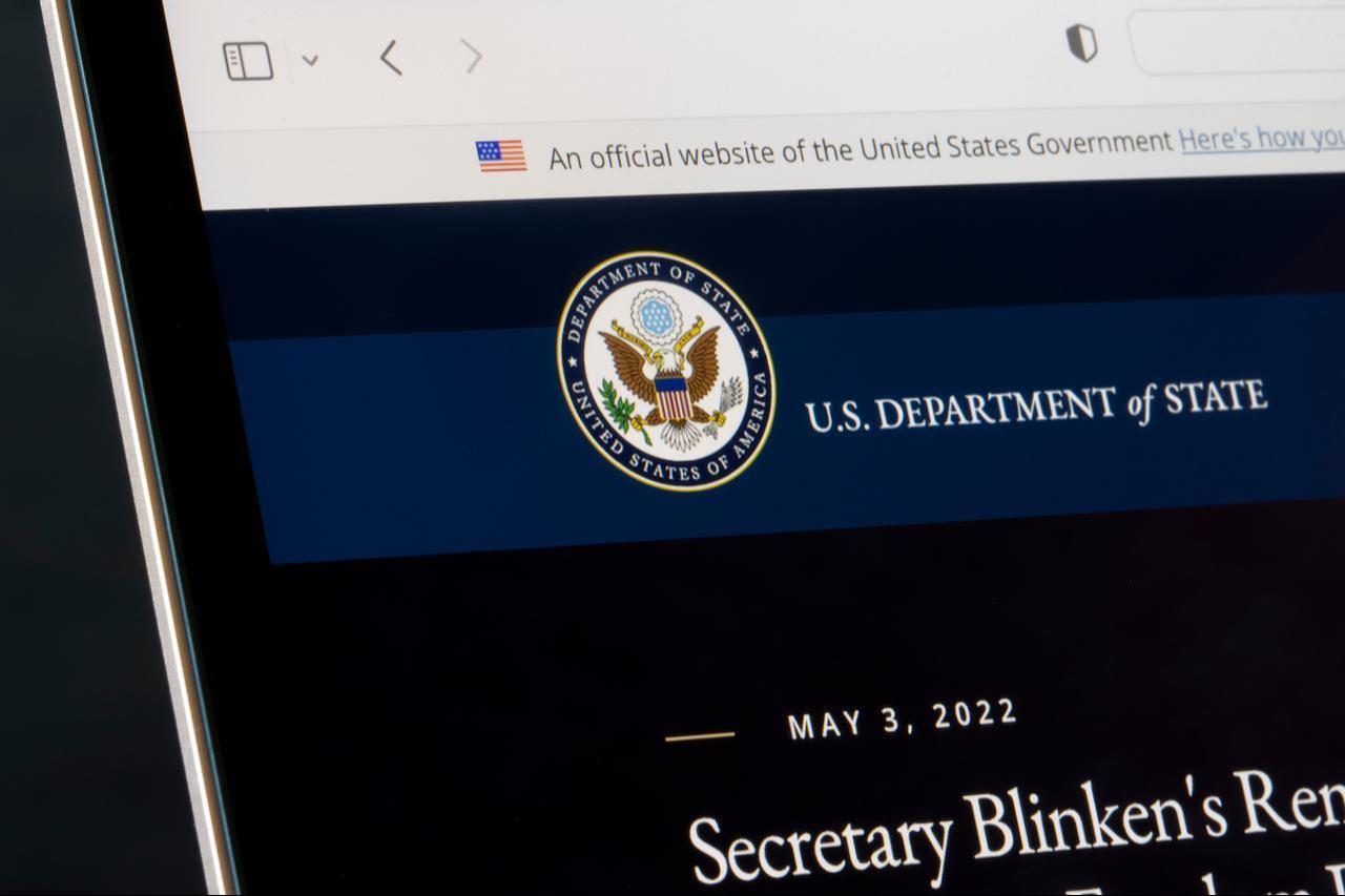 The photo shows a close-up of the website homepage of the U.S. Department of State seen on a MacBook computer in Sunnyvale, CA, US, May 4, 2022. (Adobe Stock Photo)