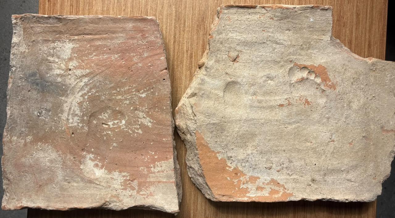 Fragments bearing ancient footprints found during excavations at Stratonikeia, where the remains of three children’s footprints were identified. (IHA Photo)