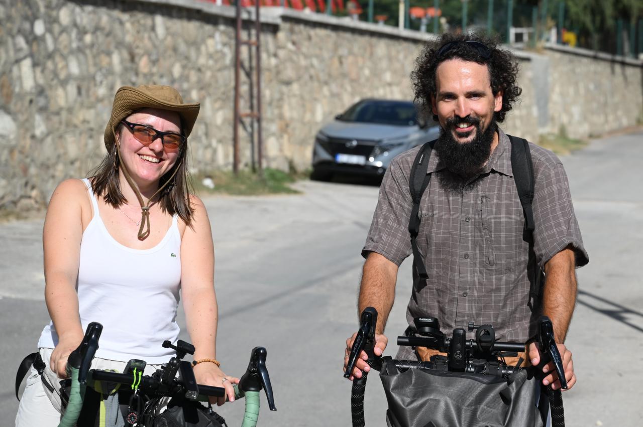 Dunja Radivojevic (L) and Igor Radivojevic pose with their bicycles during their cycling tour from Belgrade, Serbia to Istanbul, in Edirne, Türkiye, on Sept. 18, 2026. ( AA Photo)
