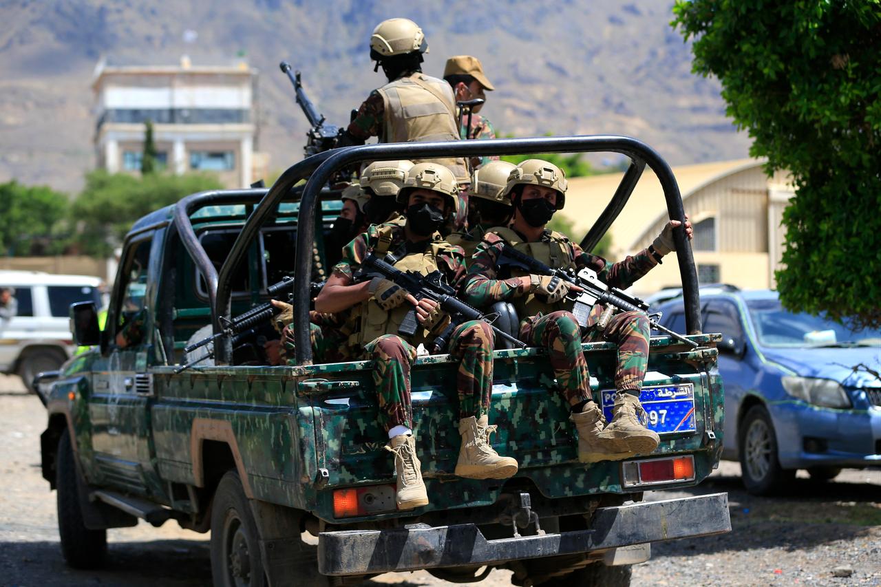 Yemen's Houthi armed forces patrol as Yemeni prisoners loyal to the Houthi authorities arrive in the capital Sanaa on September 12, 2026. (AFP Photo)