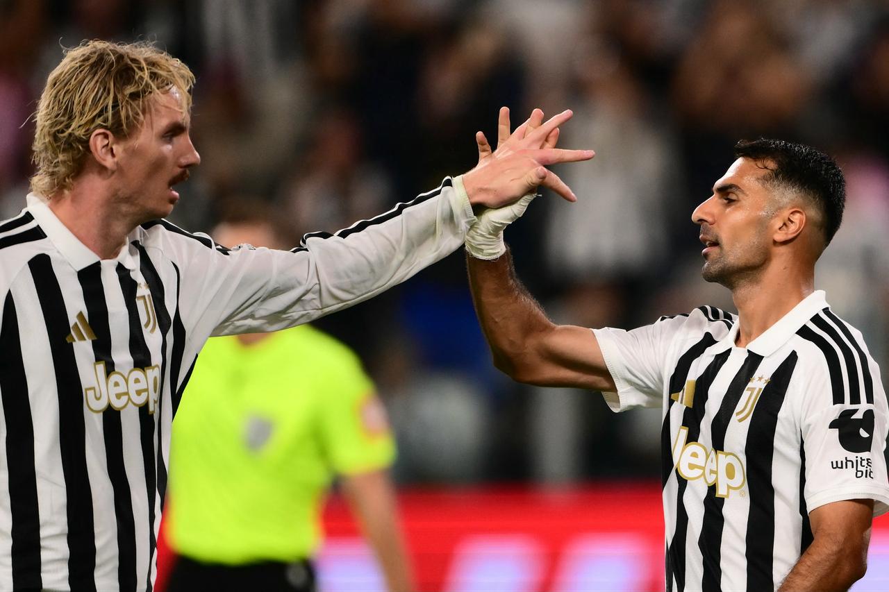 Juventus’ Turkish defender #2 Zeki Celik (R) celebrates after scoring his team's fourth goal during the UEFA Europa League 1st round day 1 football match between Juventus and NEC Nijmegen at the Allianz Stadium in Turin on September 17, 2026. (AFP Photo)