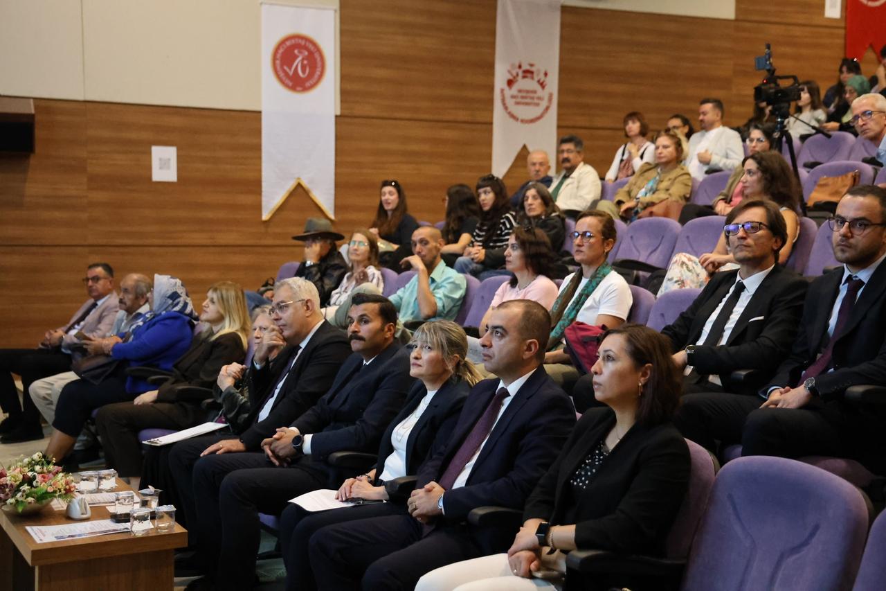 Officials, academics and researchers attend a program on the conservation and study of Cappadocia’s historic wall paintings in Nevsehir, Türkiye. (IHA Photo)