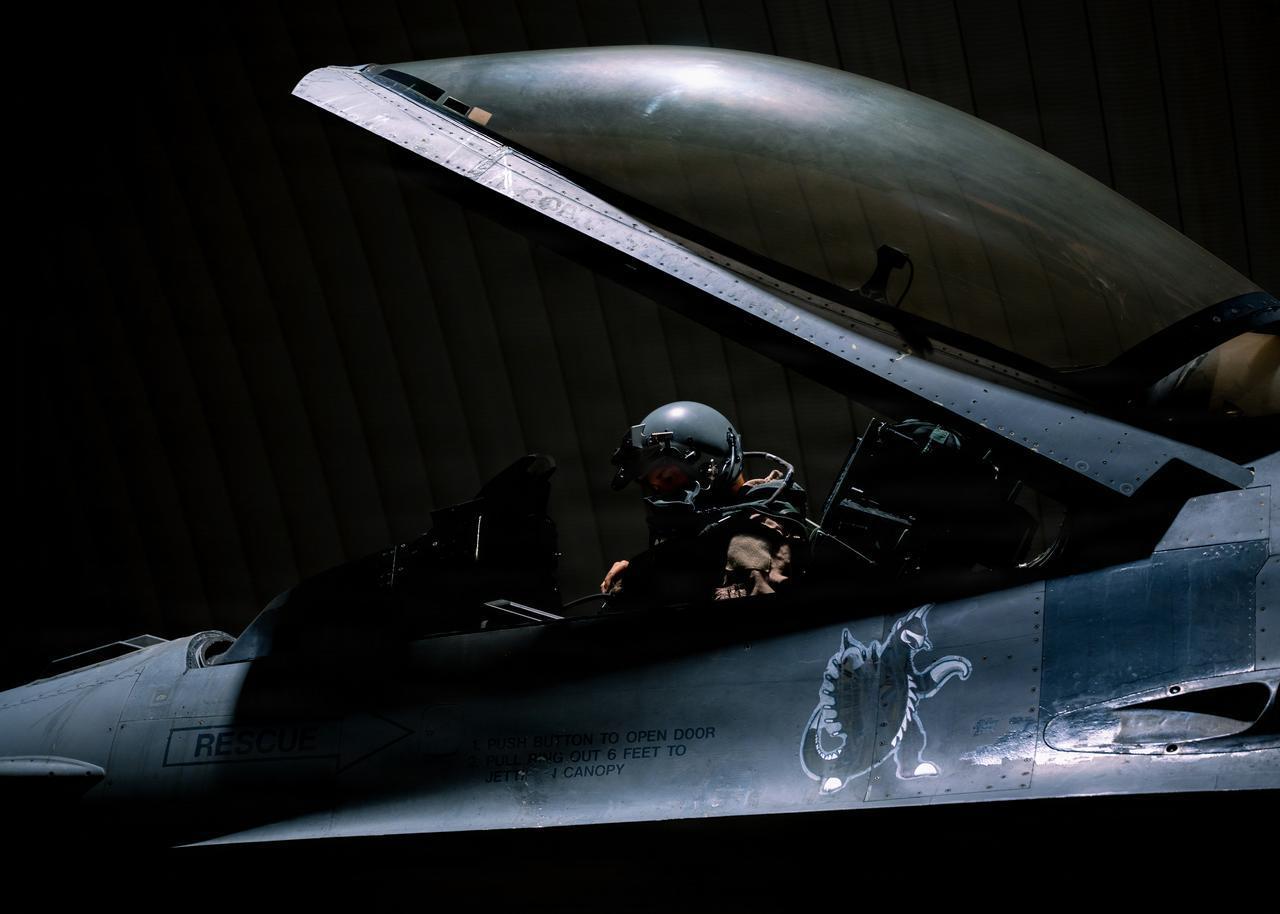 A U.S. Air Force F-16 Fighting Falcon aircraft pilot conducts preflight checks at a base in the U.S. Central Command area of responsibility Aug. 31, 2026. (Photo via U.S. Air Force)