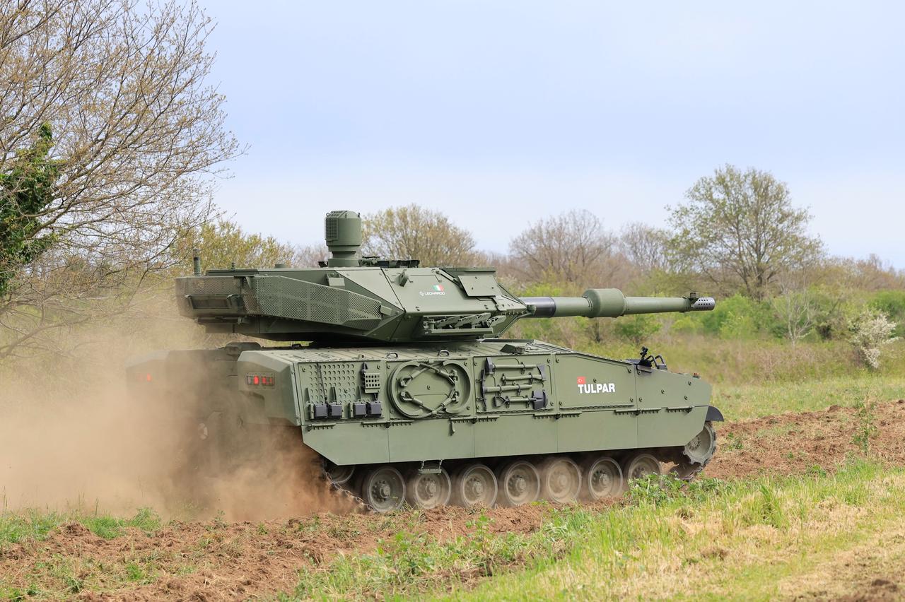 Otokar Tulpar tracked armored combat vehicle on tests with Leonardo's 120 mm HITFACT MkII Turret at an unspecified location and time. (AA Photo)