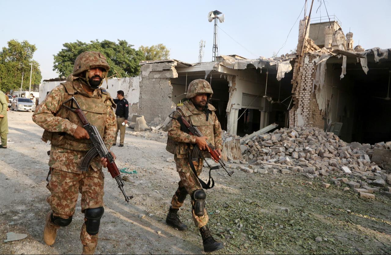 Security officials inspect the site of a blast at a mosque near the Old Police Lines in Kohat district of Khyber Pakhtunkhwa province, Pakistan, on September 18, 2026. (AA Photo)