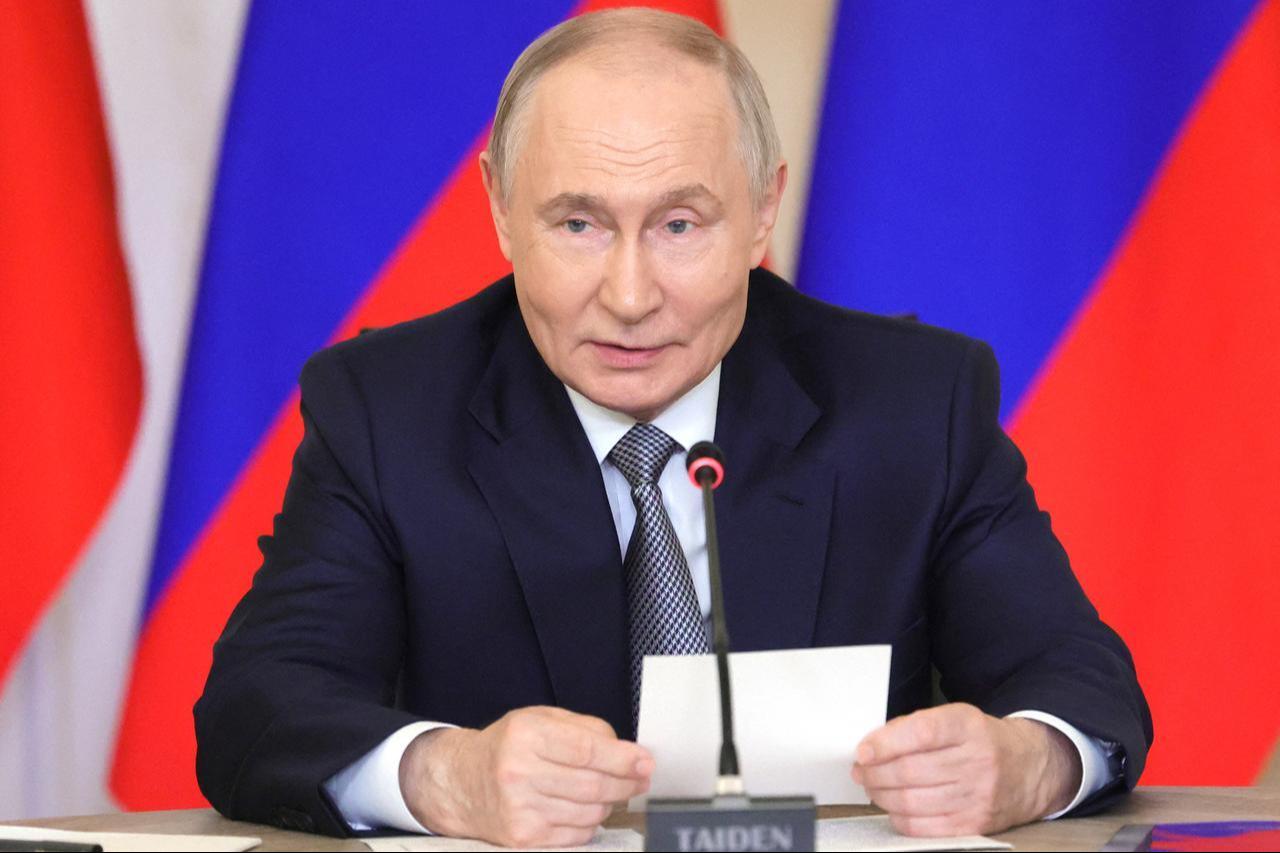 In this pool photograph distributed by the Russian state agency Sputnik, Russia's President Vladimir Putin chairs a meeting on aviation development at the Flight Research Institute named after M.M. Gromov in Zhukovsky in the Moscow region, June 24, 2026. (Photo via Sputnik/HO/AFP Photo)