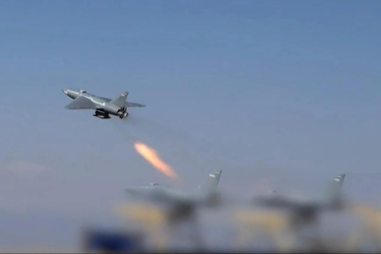 This grab taken from a video released by Iran's state broadcaster (IRIB) on April 6, 2026, shows a drone launched at US targets in Saudi Arabia and Kuwait. (Photo by IRIB News Agency/AFP)