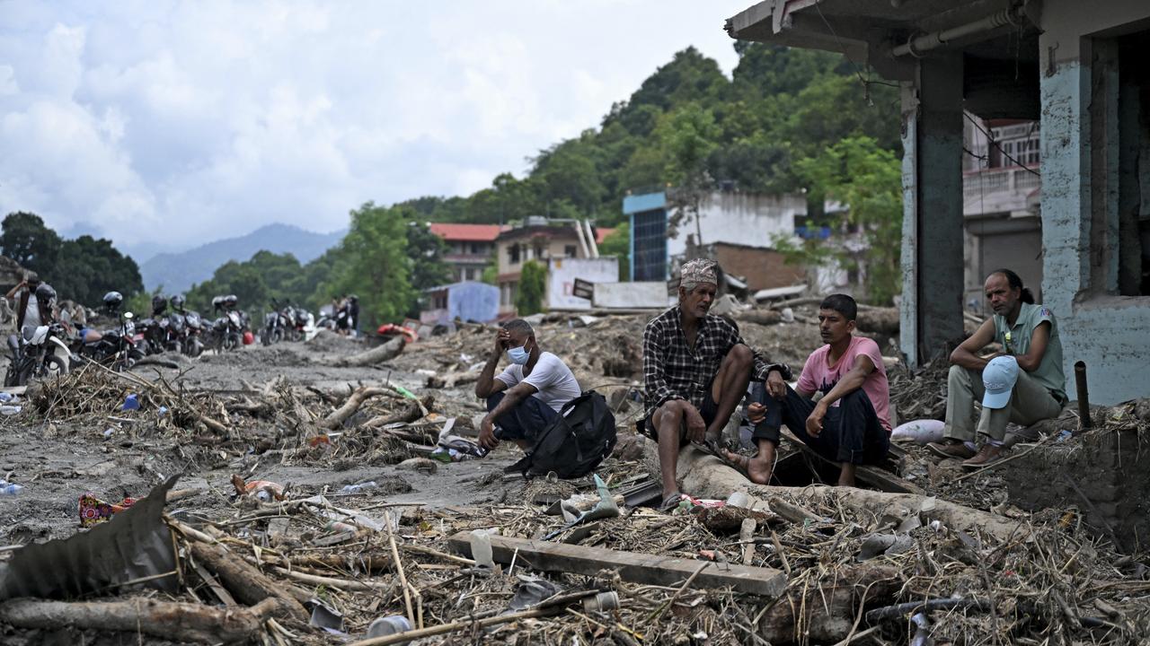 Nepali families hold funerals for flood victims