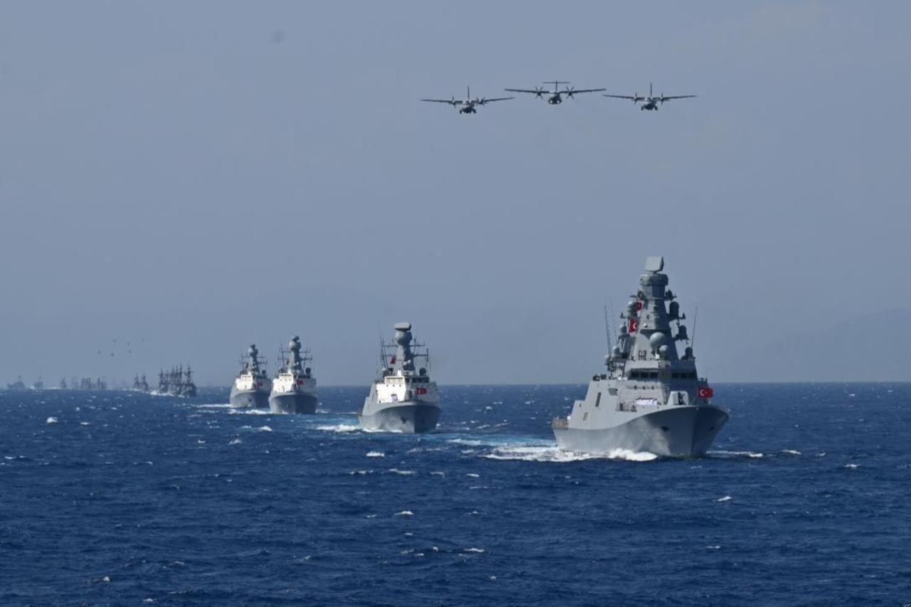 Turkish Navy warships and aircraft conduct a salute in the Aegean Sea, October 10, 2025. (AA Photo)