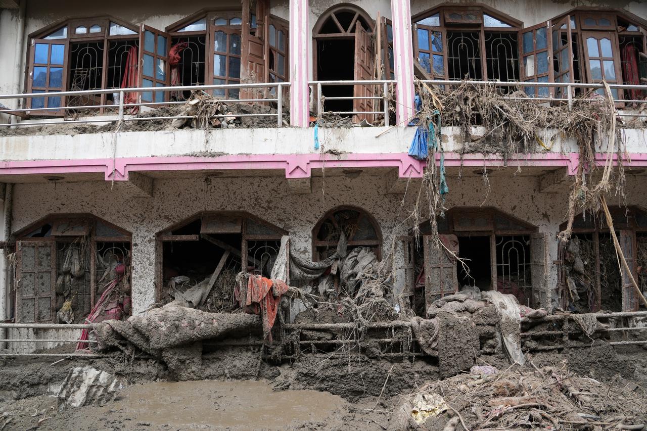 Mud, vegetation and debris cover a damaged residential building in the aftermath of flooding in Nuwakot, Nepal, Sept. 1, 2026. (AA Photo)