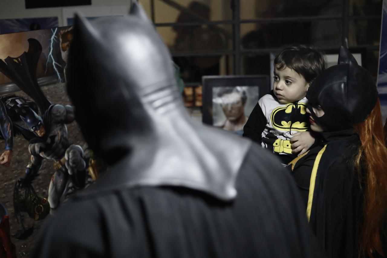 A child wearing a Batman-themed outfit attends celebrations with costumed fans marking the superhero’s 87th anniversary in Lima, Peru, Sept. 20, 2026. (AA Photo)