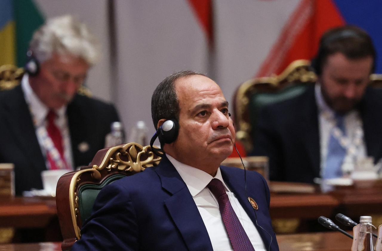 In this pool photograph distributed by the Russian state agency Sputnik, Egypt's President Abdel Fattah al-Sisi attends the 18th BRICS Summit in New Delhi on September 12, 2026. (Photo by Sputnik / AFP)