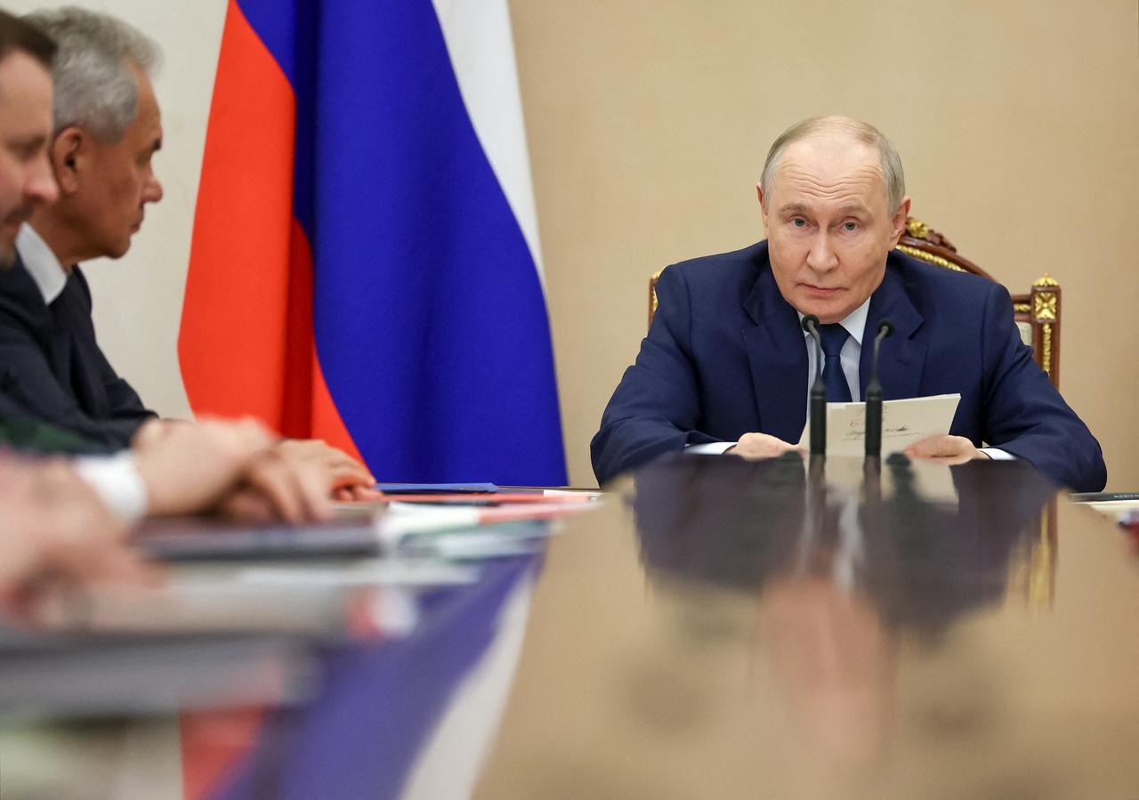 In this pool photograph distributed by the Russian state agency Sputnik, Russia's President Vladimir Putin chairs a meeting of the military-industrial commission in Moscow on September 18, 2026. (Photo by Sputnik / AFP)