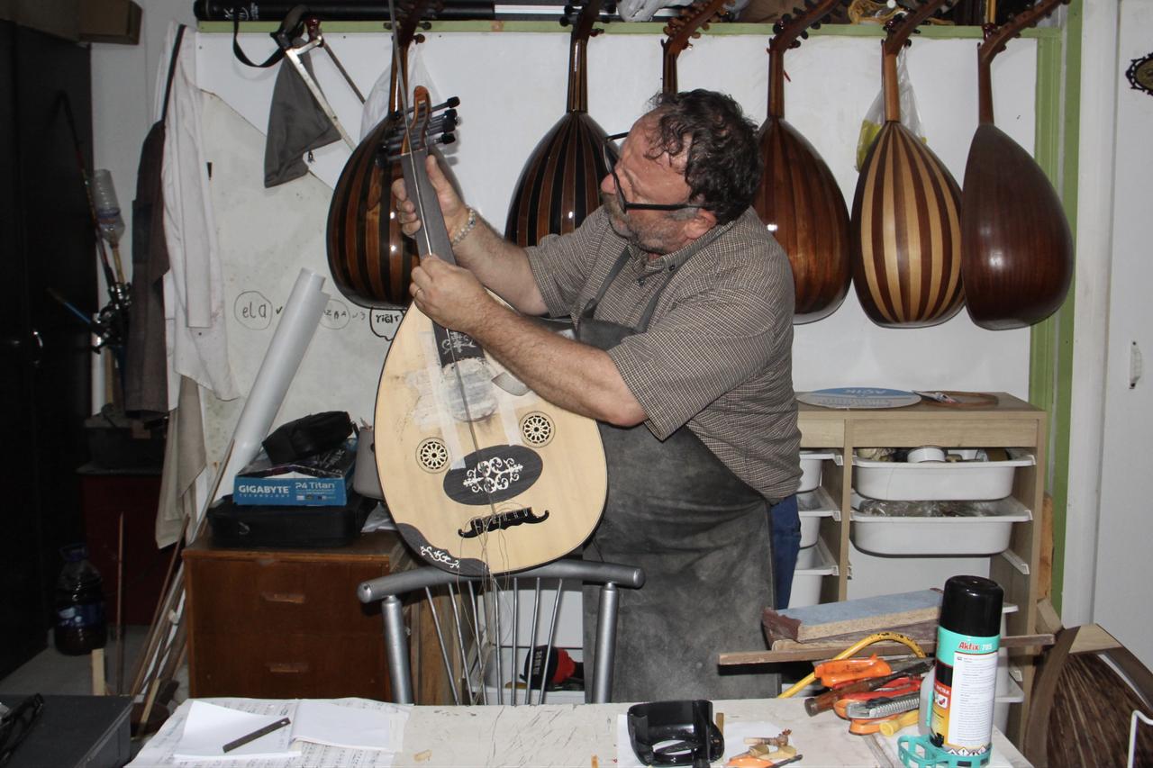 Retired musician builds ouds for 31 years after friends' dare Image