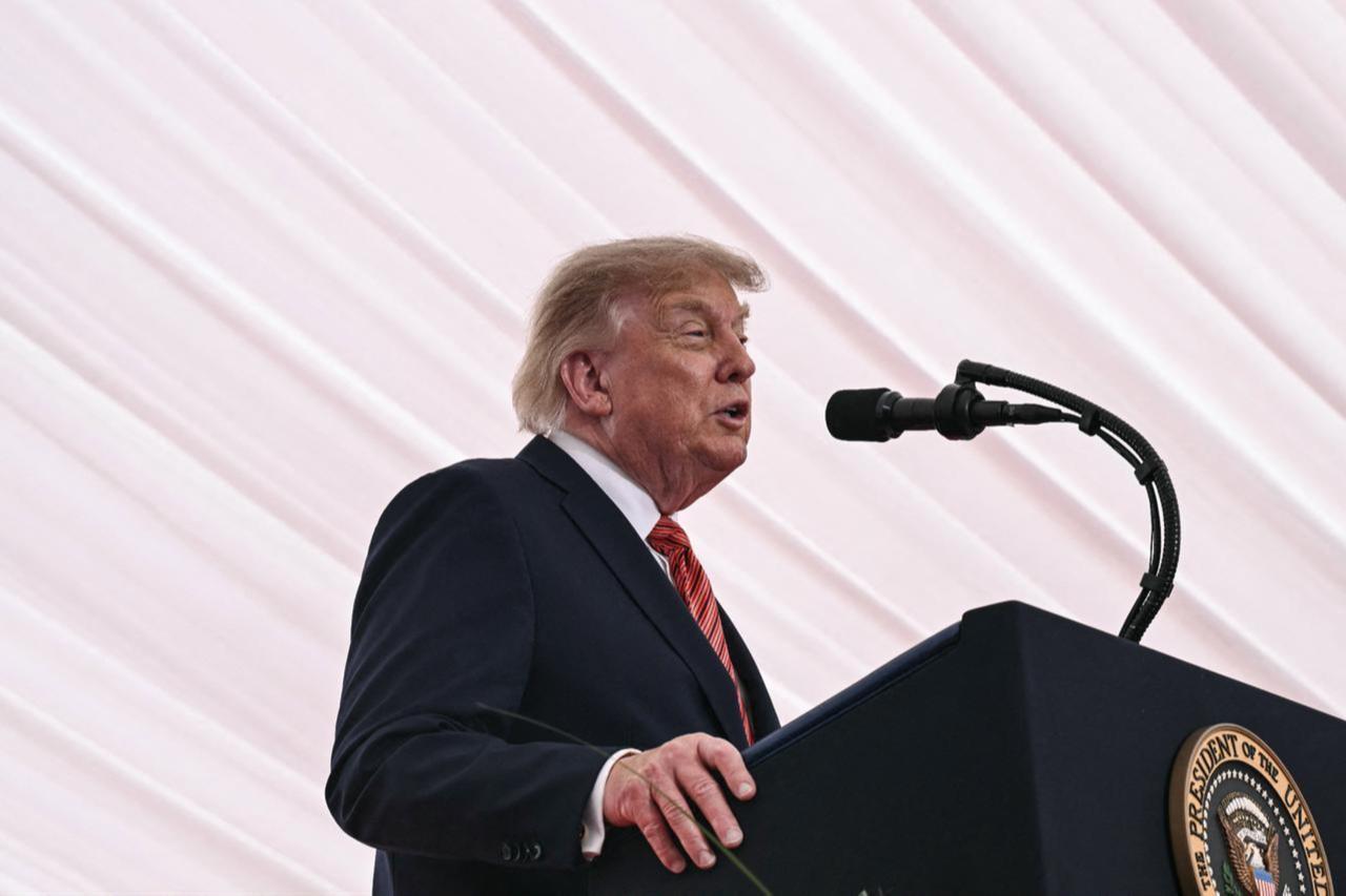 Trump asks followers to vote on new name for AI