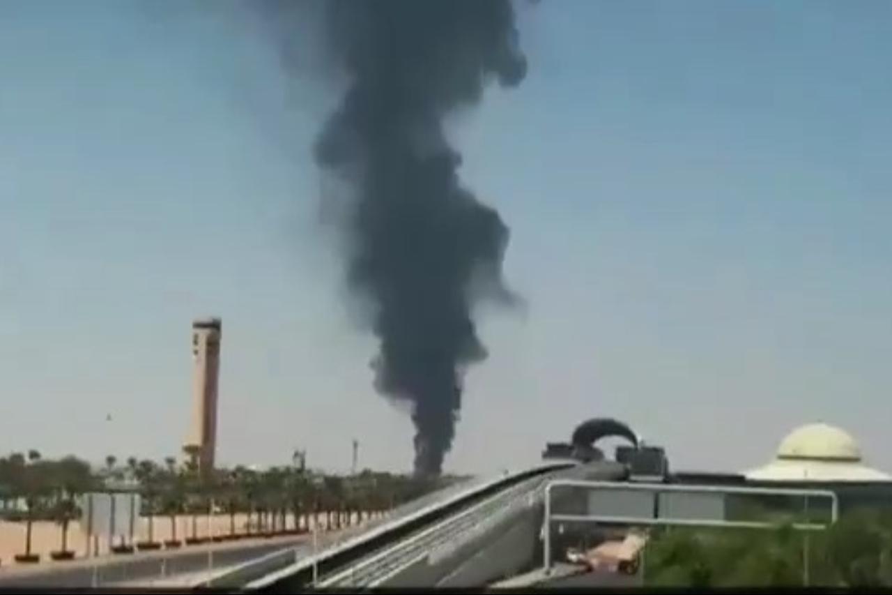 The screengrab photo shows a column of black smoke rising near Riyadh's King Khalid International Airport in Saudi Arabia on Sept. 19, 2026. (Photo via X)