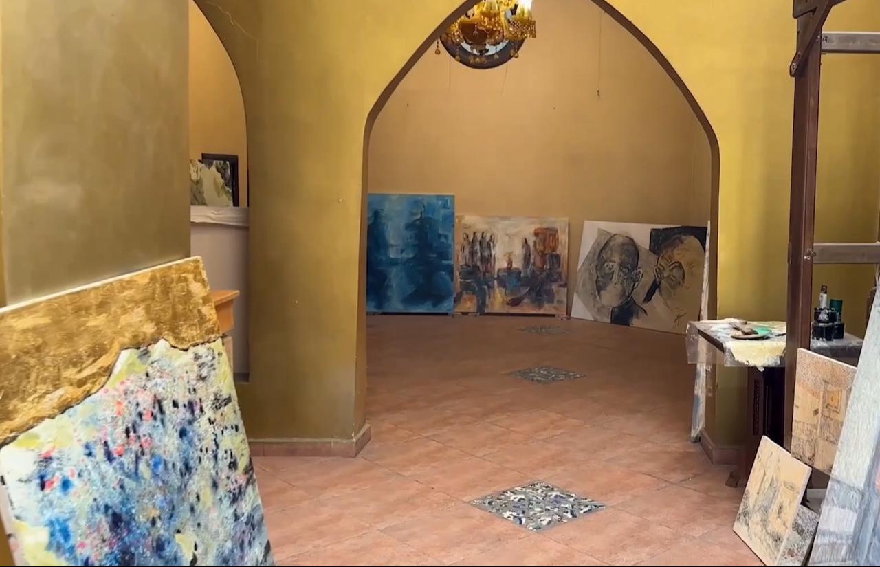 Works by Syrian artists are displayed at The Khan in Damascus’ Old City as part of the “Damascus Brings Us All Together” exhibition. (AA Photo)