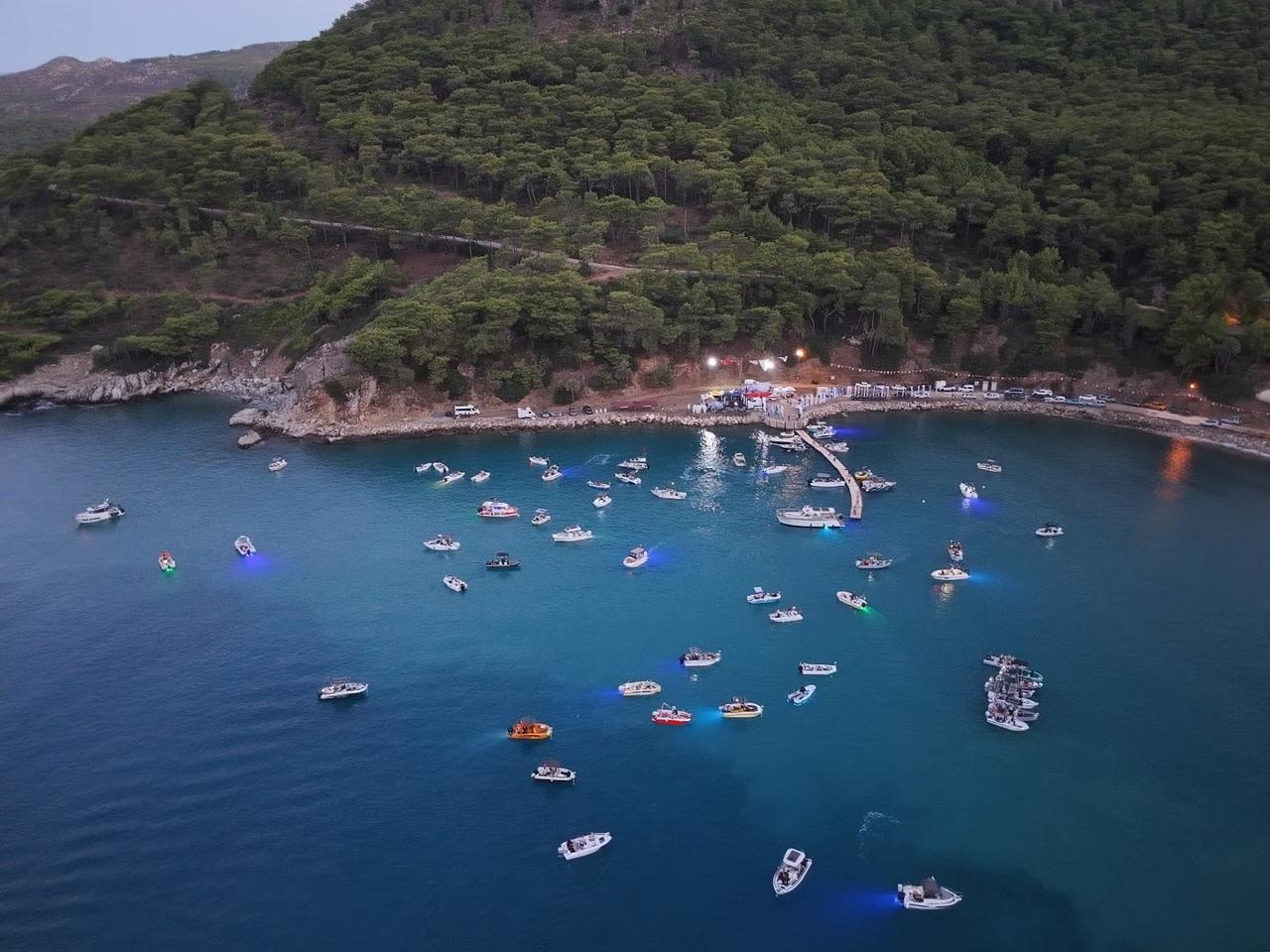 Fishing boats gather off Karaoz in Kumluca during the Kumluca Buyuk Baligin Pesinde Fishing Tournament in Antalya, Türkiye, Sept. 20, 2026. (AA Photo)