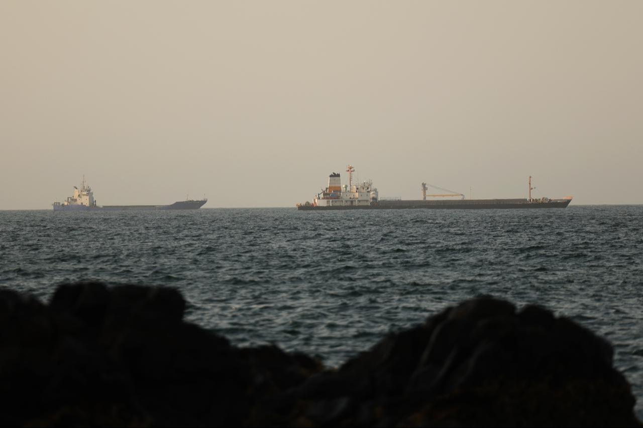 Commercial vessels and oil tankers preparing to transit through the Strait of Hormuz, one of the most critical strategic waterways for global trade flows, maintain their wait in the Gulf of Oman, June 17, 2026. (AA Photo)