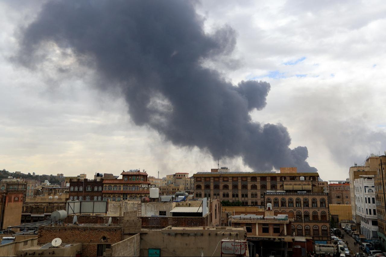 Smoke billows on the horizon following an Israeli air strike on Yemen's Houthi-held capital Sanaa on May 6, 2025. (AFP Photo)