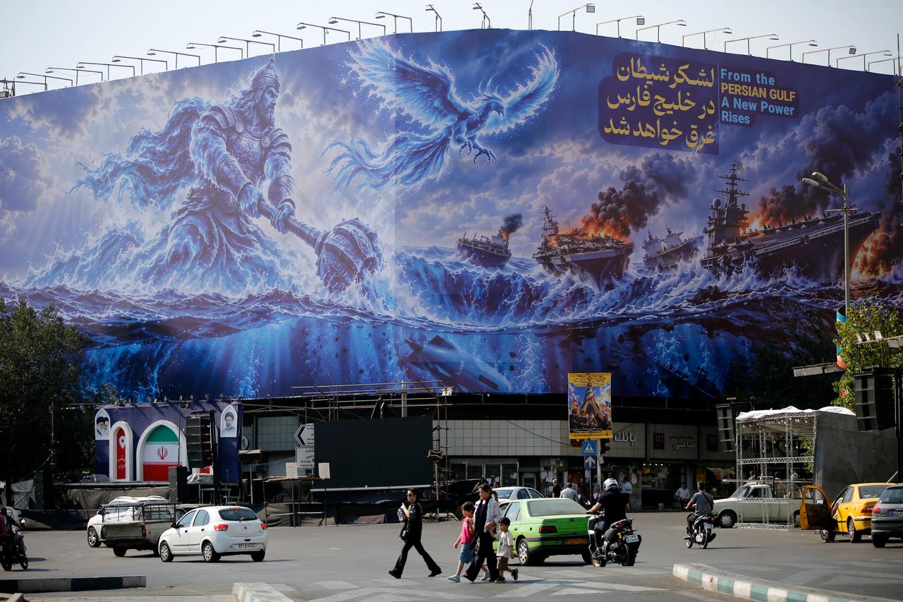 A huge anti-American billboard reading in Persian "The army of Satan will drown in the Persian Gulf" is unveiled at Enqelab Square amid heightened tensions between Iran and the United States as daily life continues in Tehran, Iran, on September 13, 2026. (AA Photo)
