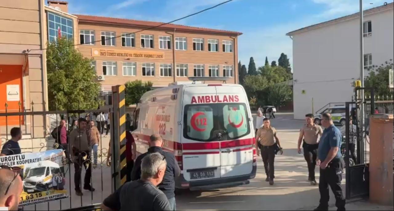 The photo shows an ambulance entering the high school in the Turgutlu district of Manisa province of Türkiye following a reported armed attack on Sept. 22, 2026. (IHA Photo)