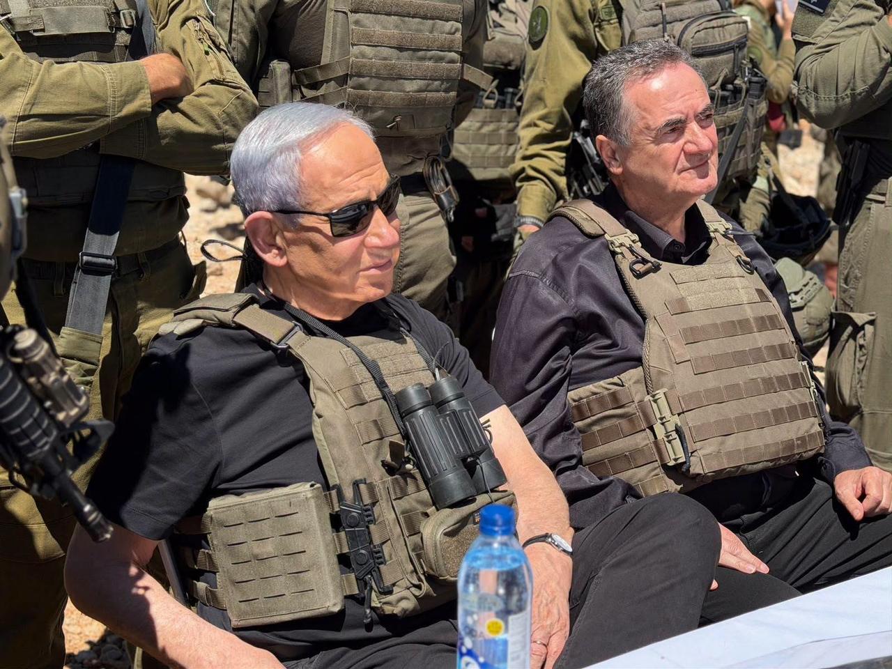 Israeli Prime Minister Benjamin Netanyahu (L) and Israeli Defense Minister Israel Katz (R) visit Israeli troops in the Mount Hermon (Jabal al-Sheikh) area near the Syrian Golan Heights in Syria, Sept. 9, 2026. (Israeli Prime Minister's Office/Handout)