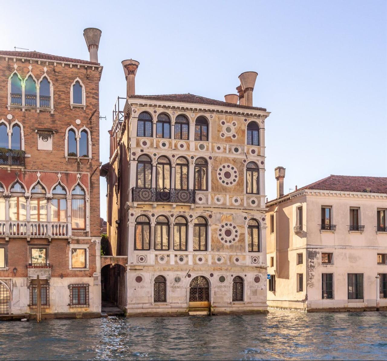 Ca’ Dario’s asymmetrical façade facing the Grand Canal in the Dorsoduro district of Venice, Italy. (Photo via Christie’s Real Estate)