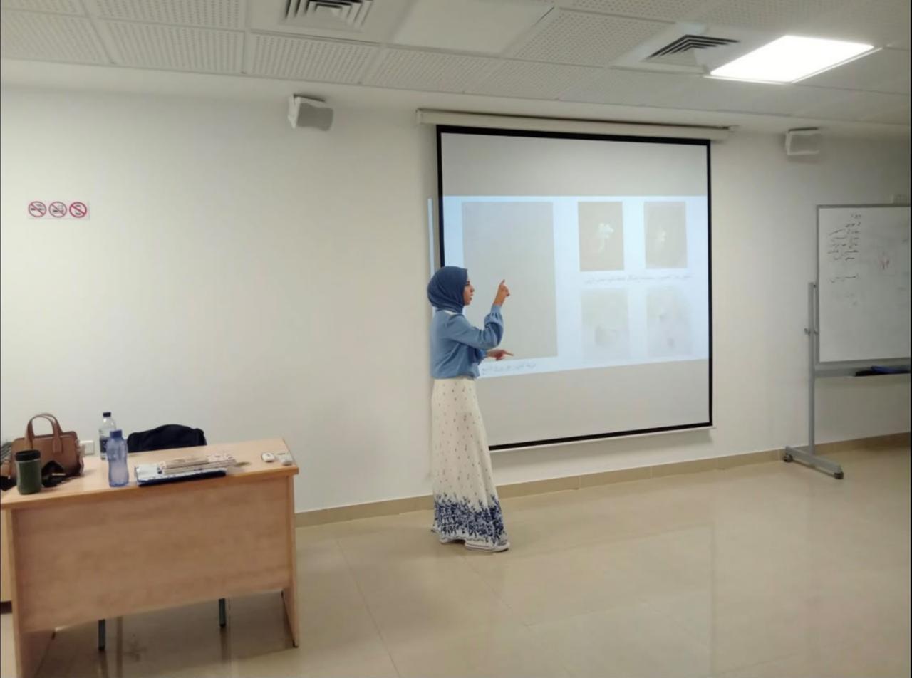 Jinan presents one of her jewelry-design projects during her studies in Istanbul. Her interest in jewelry began in the fifth grade, when she sold handmade bracelets to her classmates. (Photo courtesy of Jinan)