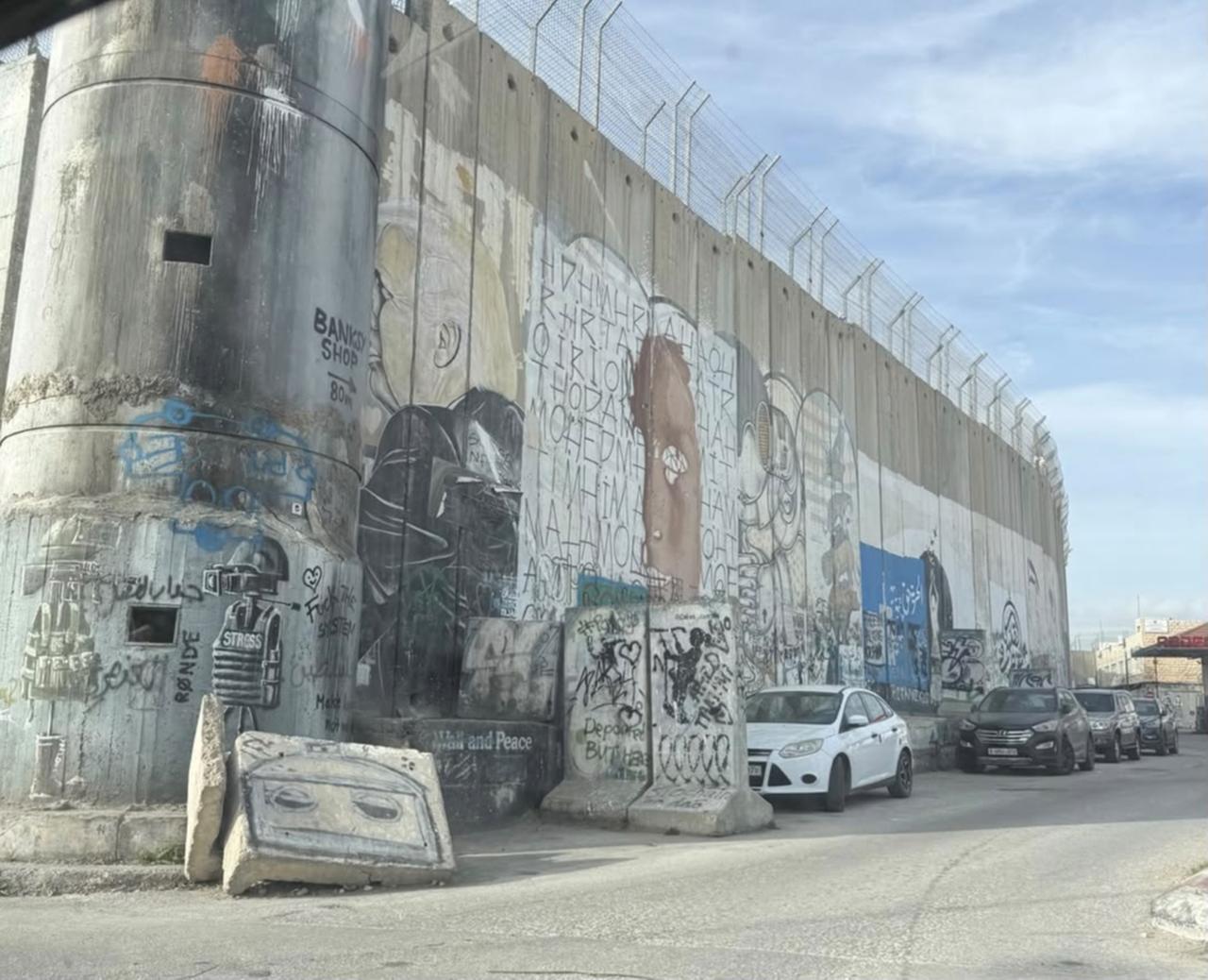 A section of the separation barrier in the occupied West Bank. By December 2025, the U.N. had documented 925 movement obstacles across the West Bank, including East Jerusalem. (Photo by Nour Dajani)