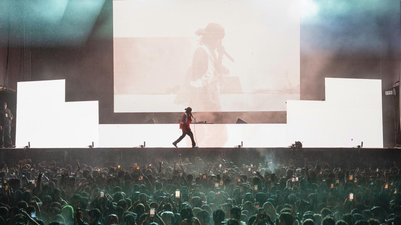 American producer Metro Boomin performing on stage for fans at Kucukciftlik Park in Istanbul under heavy rain. (AA Photo)