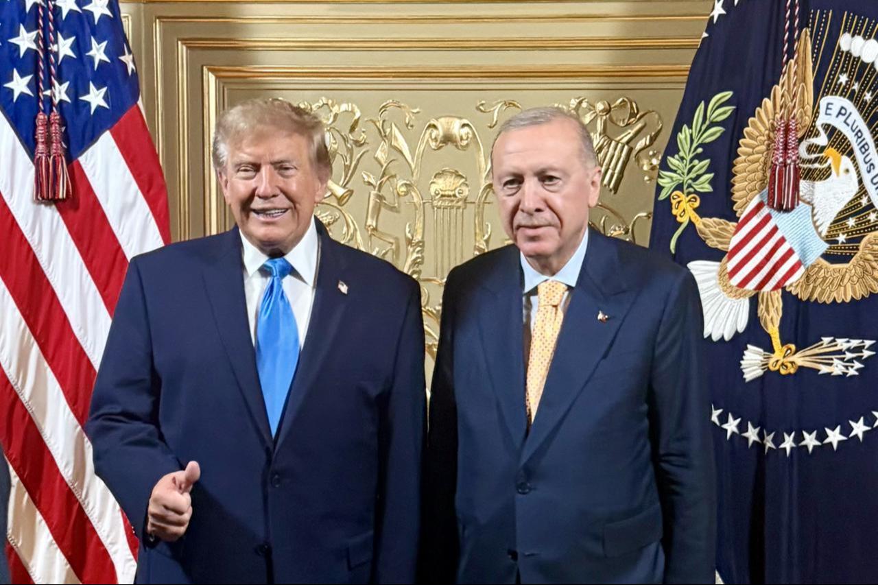 Turkish President Recep Tayyip Erdogan (R) gestures alongside US President Donald Trump (L) as he attends a reception hosted by Trump in honor of heads of state and their spouses participating in the 81st session of the United Nations General Assembly, Sept. 22, 2026. (Photo by TUR Presidency / Handout / AA)