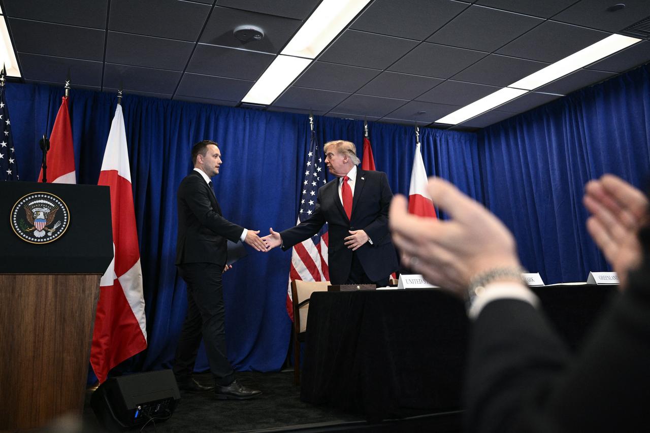 US President Donald Trump shakes hands with Greenland's Prime Minister Jens-Frederik Nielsen (L) after the US, Denmark, and Greenland signed a trilateral security deal on the sidelines of the 81st United Nations General Assembly in New York, on September 22, 2026. (AFP Photo)