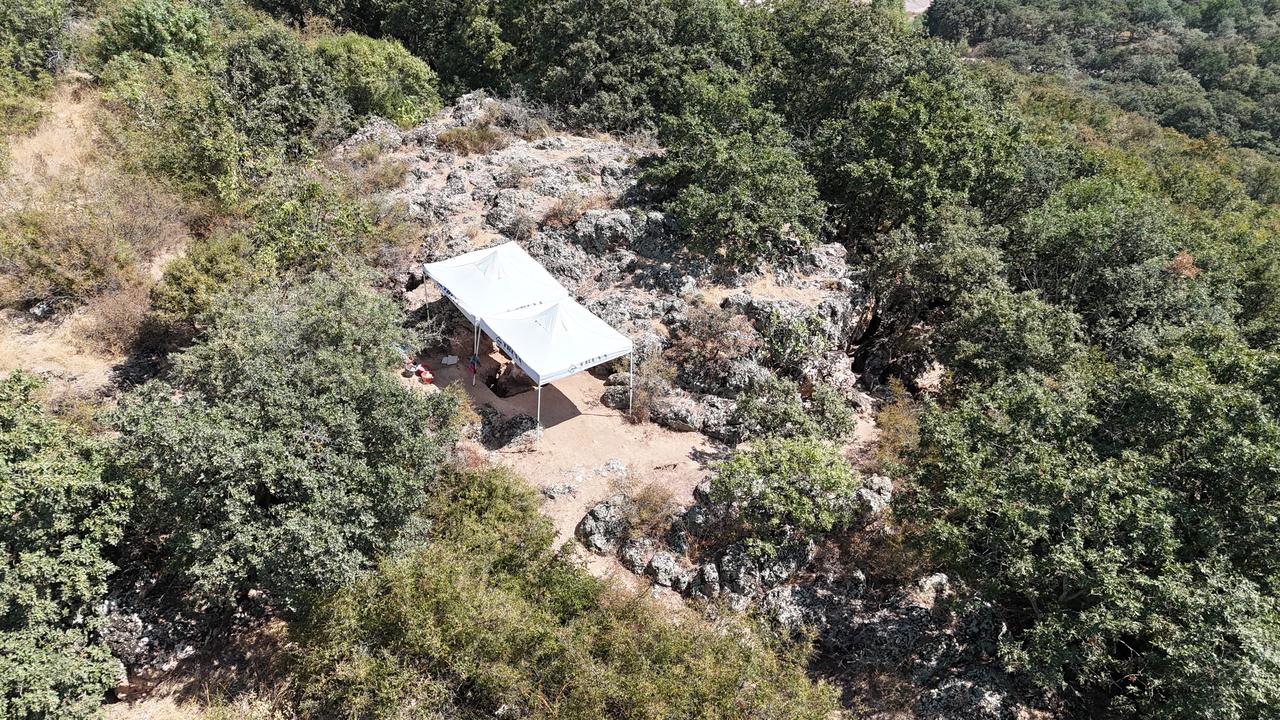 An aerial view of the excavation area at Inkaya Cave in Canakkale, northwestern Türkiye. (IHA Photo)