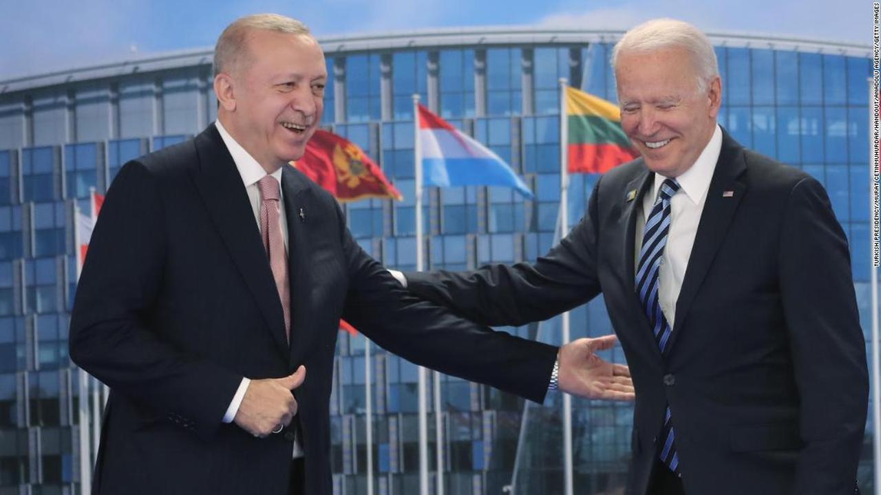 President Recep Tayyip Erdogan greets US President Joe Biden at the NATO summit at the North Atlantic Treaty Organization (NATO) headquarters in Brussels, on June 14, 2021. (Photo by Turkish Presidency / Murat Cetinmuhurdar / Handout via Anadolu Agency)