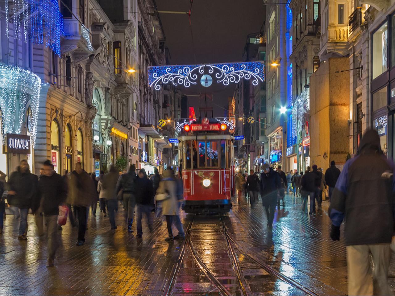 A historic red tram makes its way along Istanbul's Istiklal Avenue, one of the city's best-known cultural and entertainment districts. (Photo via Culture and Tourism Ministry)