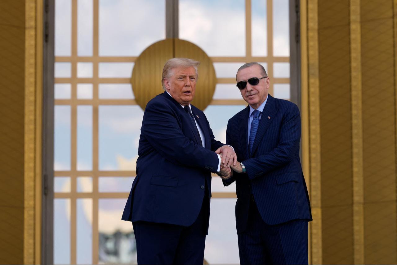 President Recep Tayyip Erdogan (R) shakes hands with US President Donald Trump during a state arrival ceremony at Bestepe Presidential Compound in Ankara, July 7, 2026. (AFP Photo)