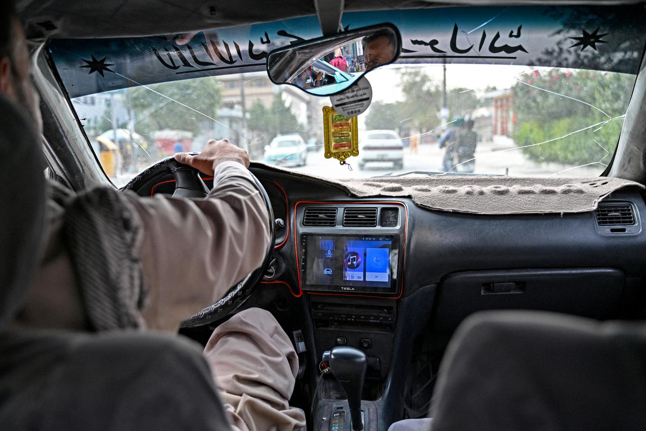 Afghan taxi drivers defy Taliban's 5-year music ban