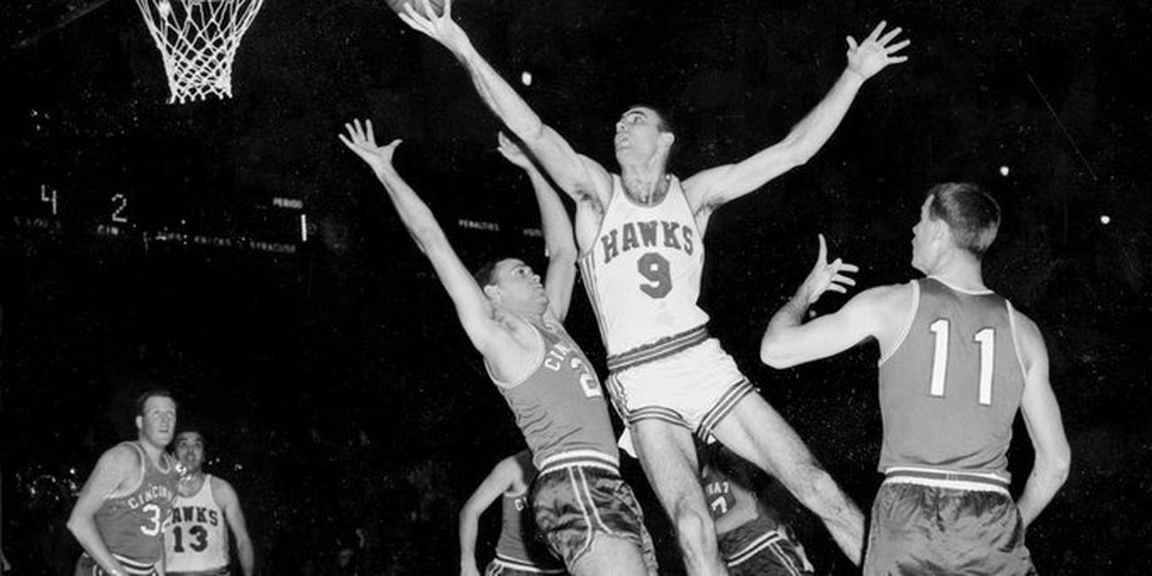St. Louis Hawks star Bob Pettit (#9) in action during a game against the Cincinnati Royals at Madison Square Garden. (Photo via X/@@11AliveSports)